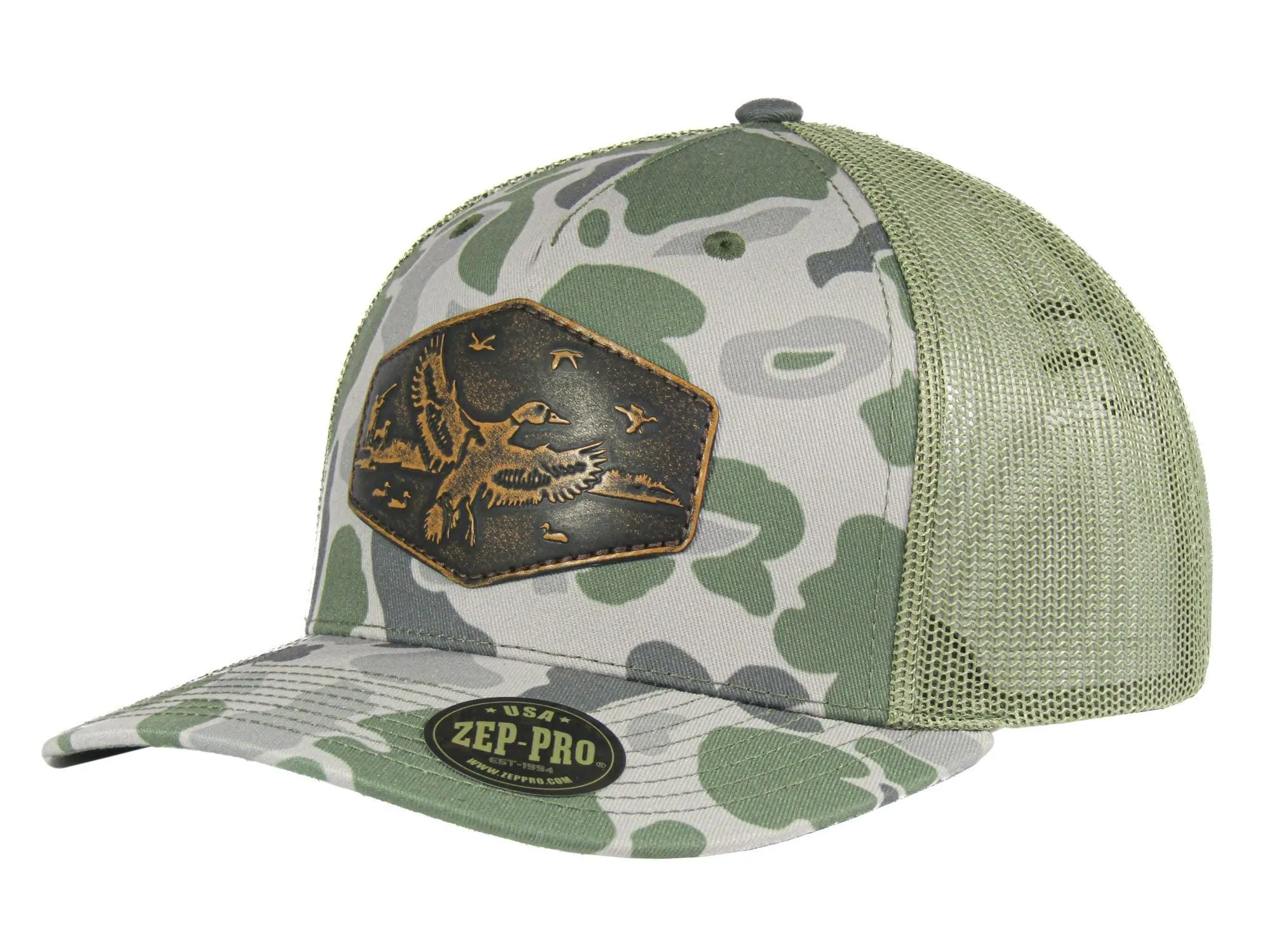 Mallard Old School Camo Trucker Hat. Hand Burnished Full Grain Leather Patch. 5-Panel Richardson 112 Snapback Cap. Stitched Duck Patch.